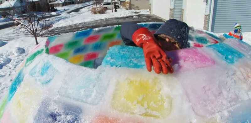 woman creating a rainbow igloo