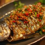 Dry Fish dish from iceland, on a plate with vegetable sides